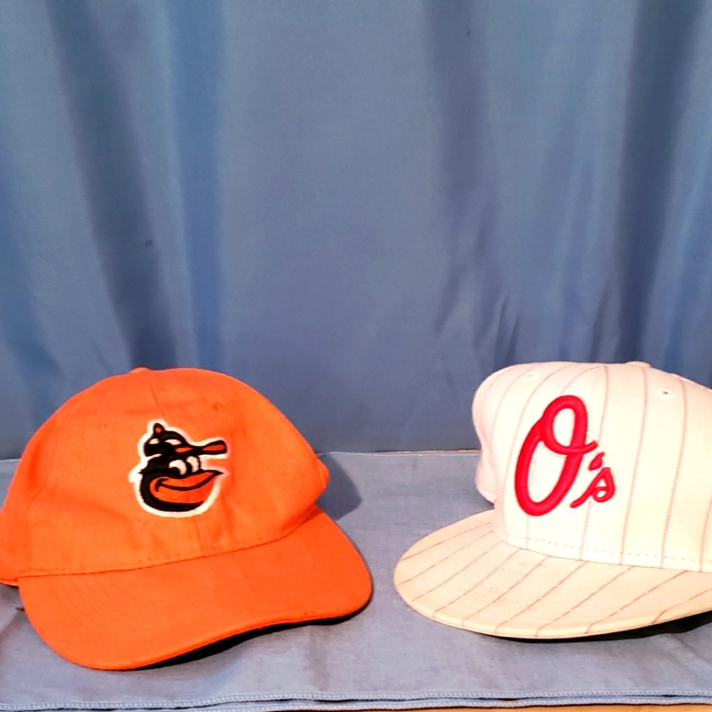 Balance Orioles- 1 fitted white/red stripe size 7 1/2 & orange/velcro backing